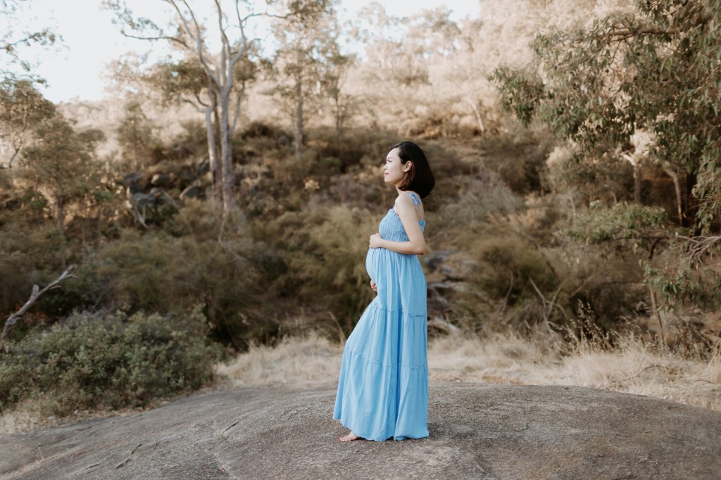 Maternity photoshoot with beautiful blue dress at Lesmurdie Falls, Perth, Western Australia